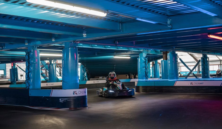 Experience the excitement of indoor go-kart racing on a modern track.